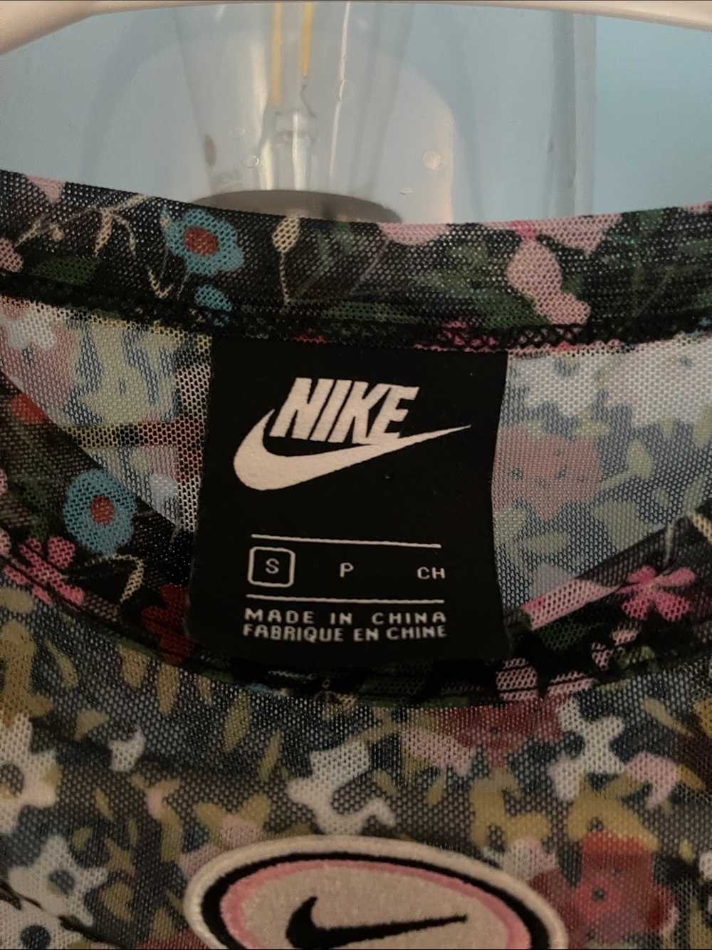 Nike Black Sheer Floral Mesh Short Sleeve Top - Picture 2 of 3